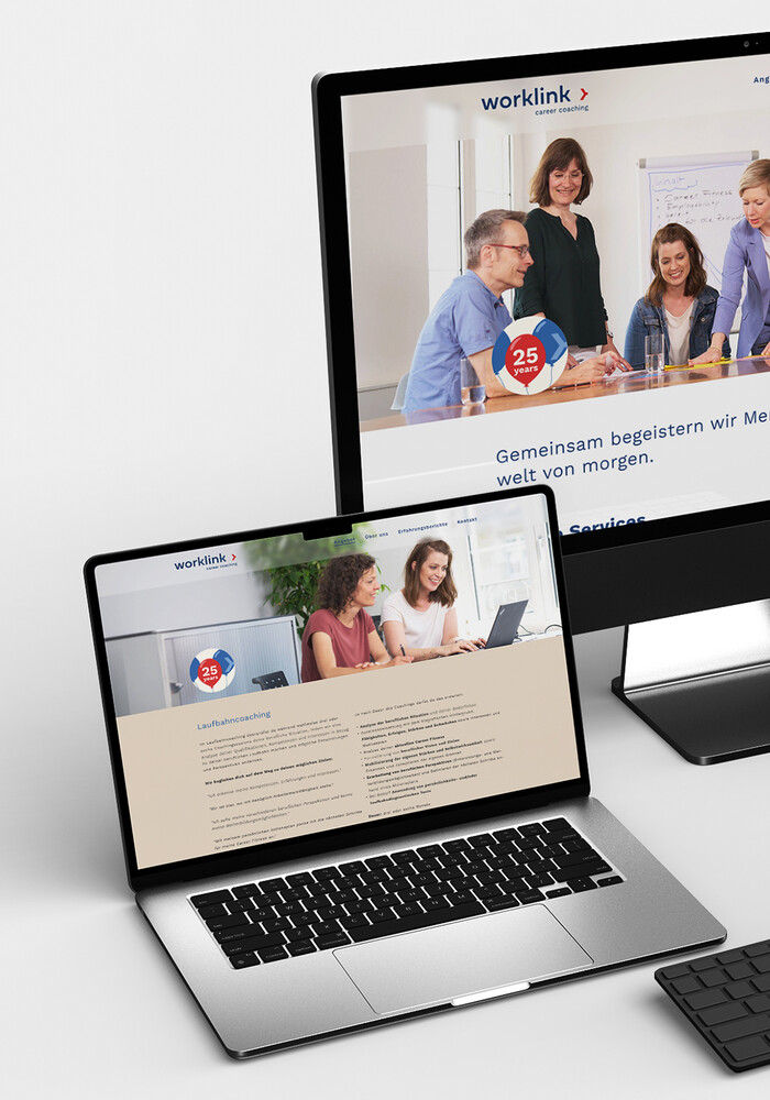 Die Website WORKLINK auf Bildschirm und Laptop